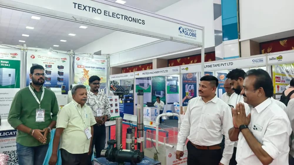 Visitor evaluating display systems at the Textron Electronics stand